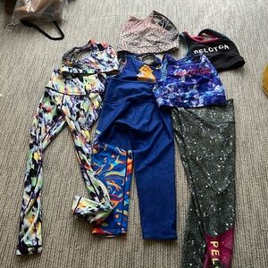 Peloton lot. Two matching sets.  Almost all small. One set is xsmall